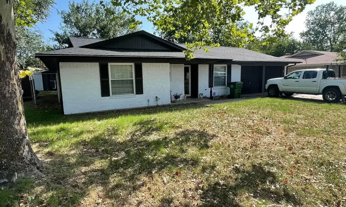 Professional roofing crew working on a residential roof in Millersville